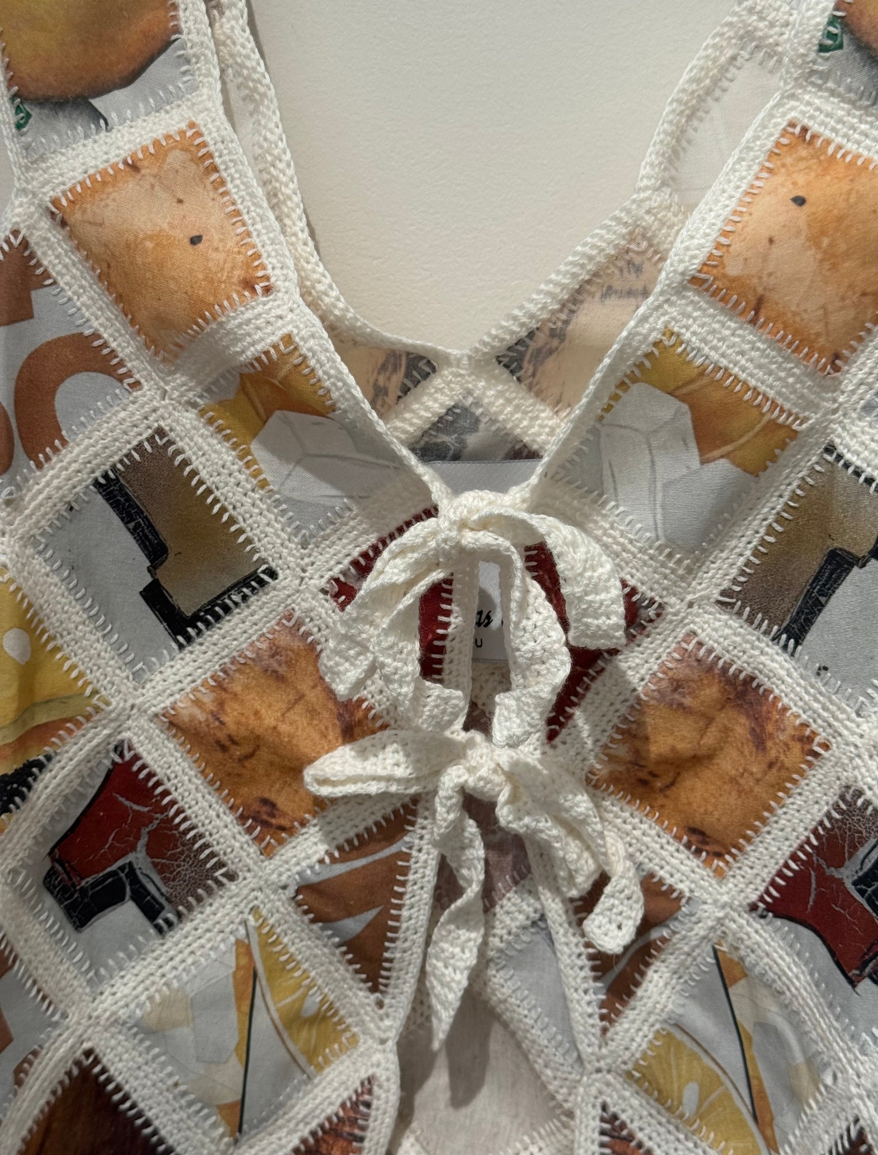 ‘RETAZOS’ VEST PAPAYA